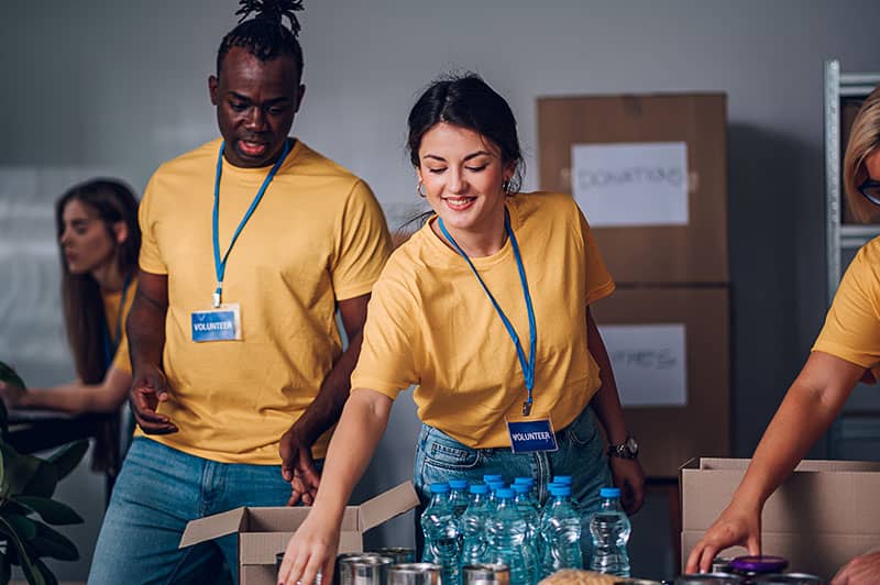 group-of-multiracial-volunteers-working-in-community